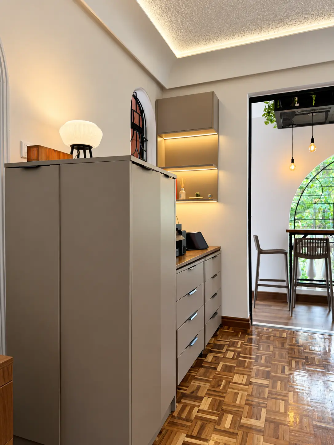 Purpose-built storage and print area leading toward the studio terrace